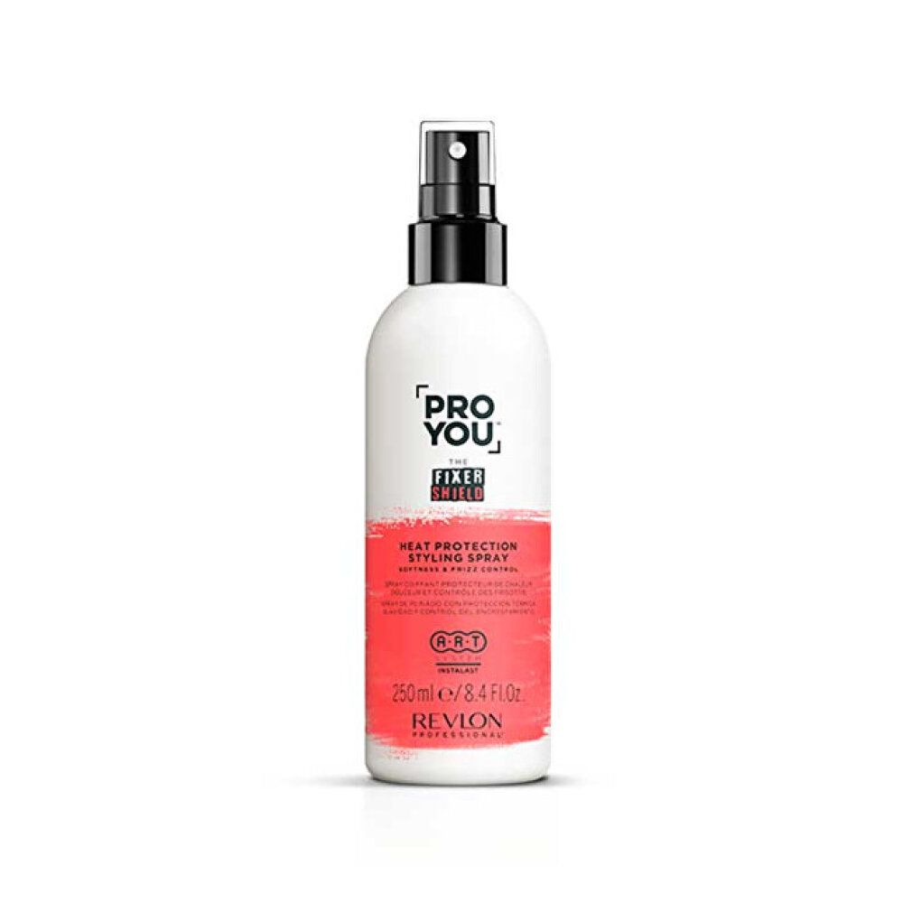 Flacone spray bianco e rosso. Testo: PRO YOU, THE FIXER SHIELD, HEAT PROTECTION STYLING SPRAY, REVLON PROFESSIONAL. Erogatore nero.