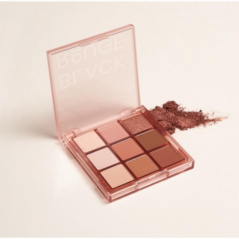 Palette ombretti rosa con nove tonalità. La palette è alloggiata in un astuccio rosa trasparente.