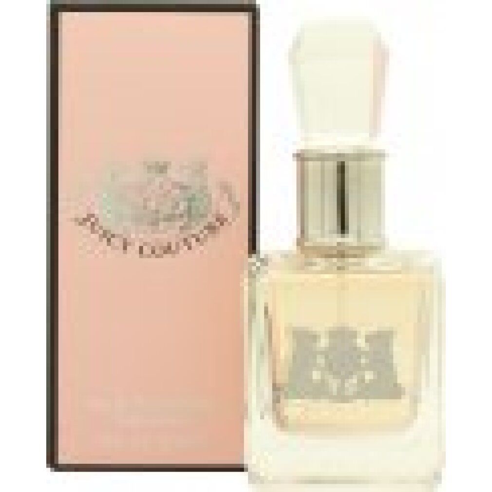 Flacone di profumo e confezione rosa. Flacone con tappo argento. Scritta Juicy Couture.