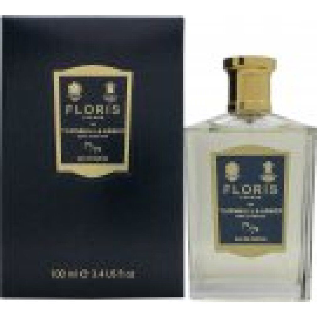 Flacone di profumo e scatola. Flacone con tappo dorato, etichetta con logo e testo. Scatola con logo e testo.