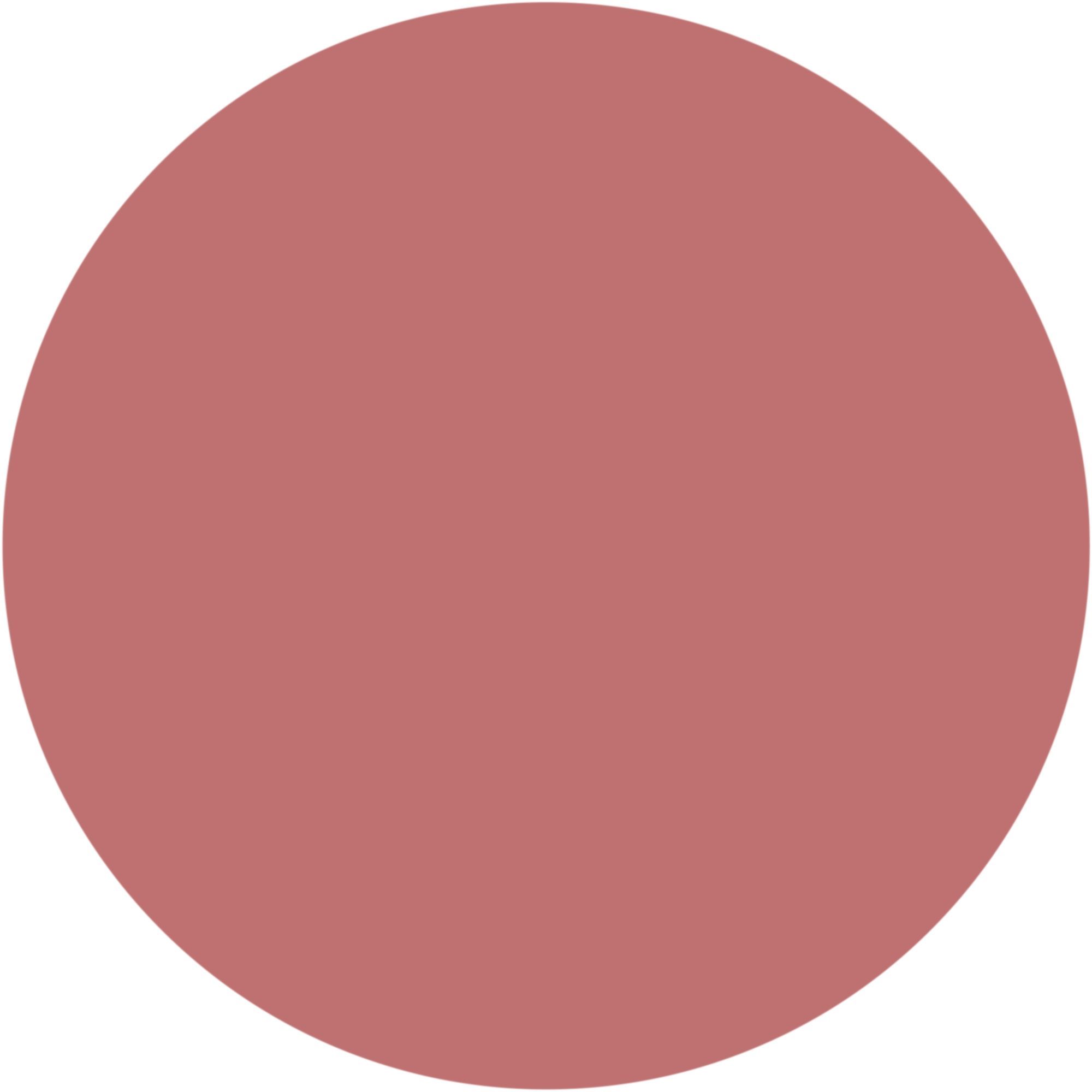 Una macchia di colore circolare di WYCON Cosmetics Balmy Cheeks 302 Warm Desire. Il colore è un rosa caldo. La macchia è posta su sfondo bianco.