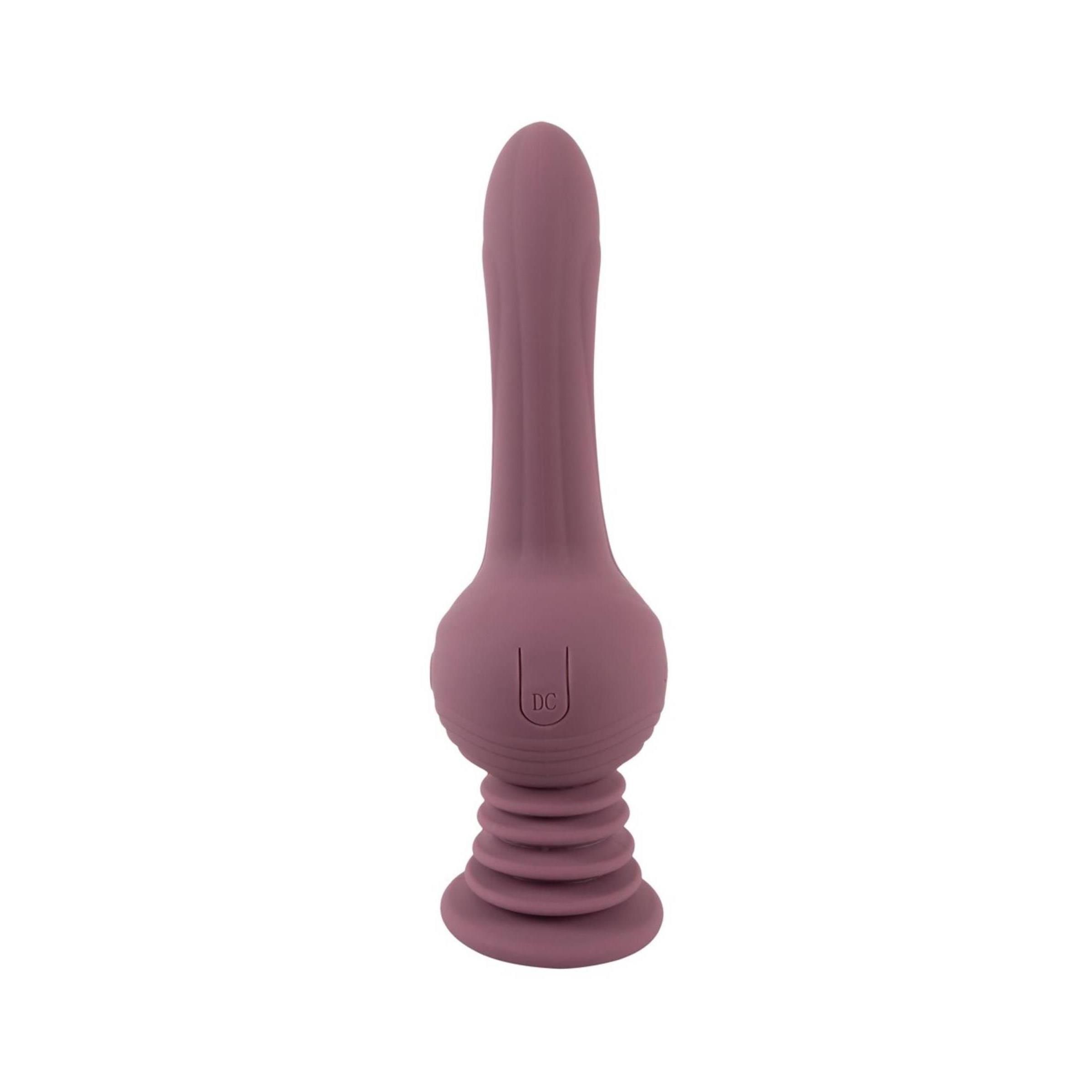 Vibratore lilla con base scanalata e superficie liscia. Orientamento verticale, su sfondo bianco.