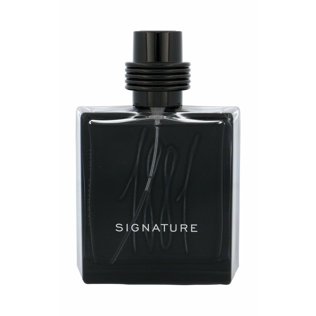Flacone nero con vaporizzatore nero. Scritta "SIGNATURE". Flacone di forma quadrata con angoli arrotondati.