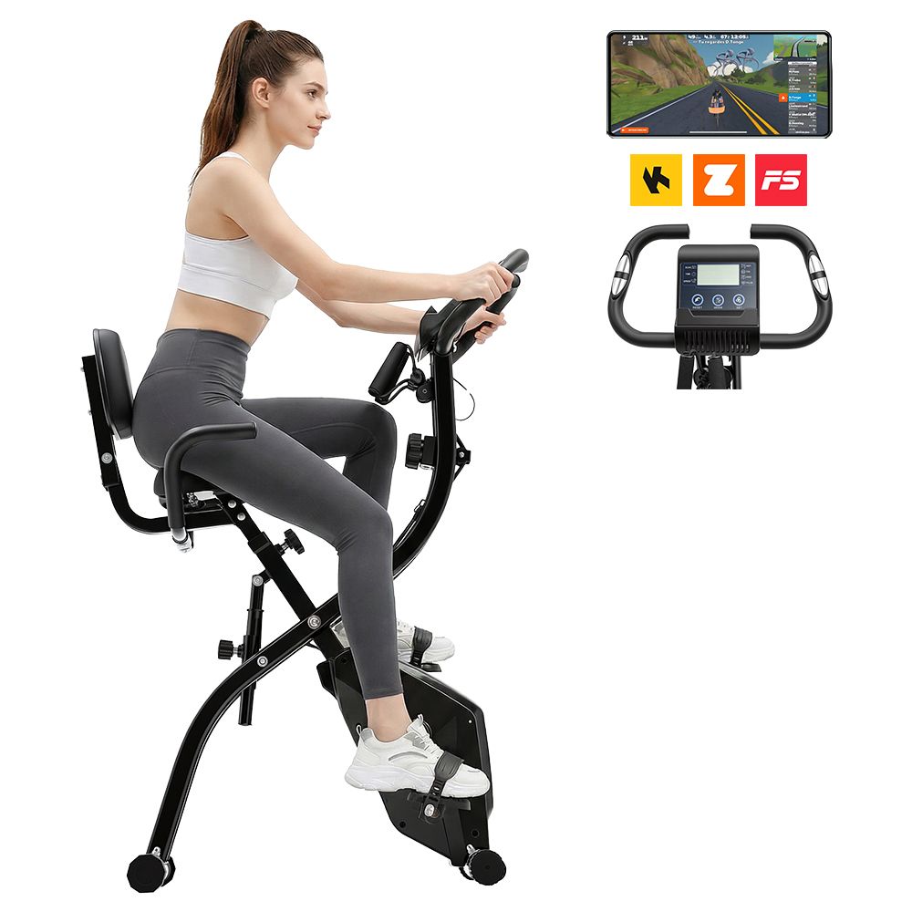 Donna su cyclette nera. Display con app di allenamento. Loghi Z, F5. Cyclette con sedile e manubrio.