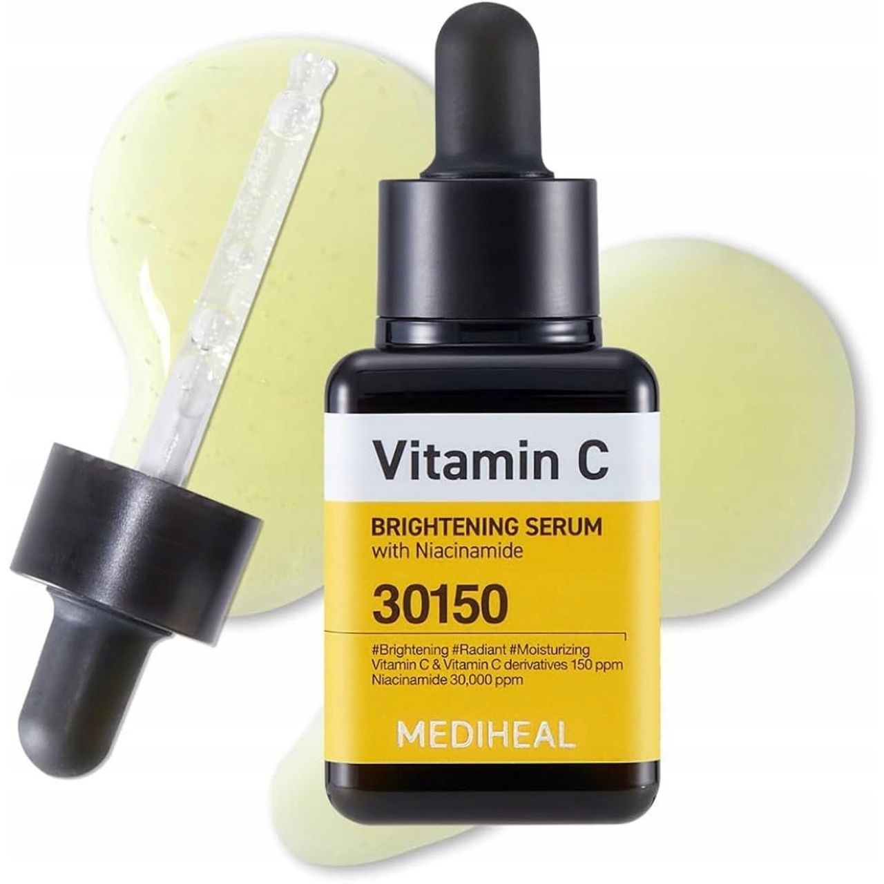 Flacone di siero Mediheal Vitamina C con contagocce, circondato da gocce di siero. Etichetta gialla con informazioni sul prodotto.