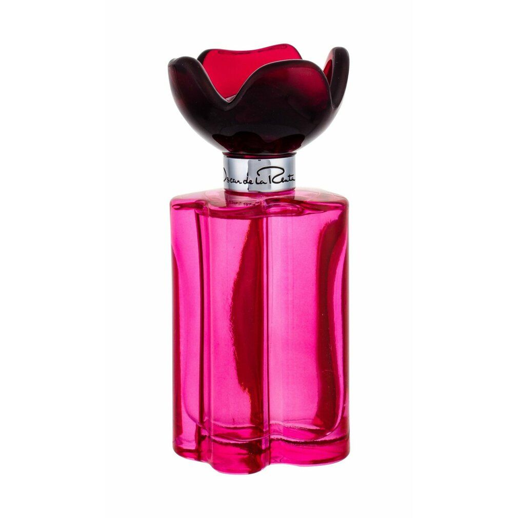 Flacone rosa con tappo a fiore nero. Sul flacone è scritto "Oscar de la Renta".