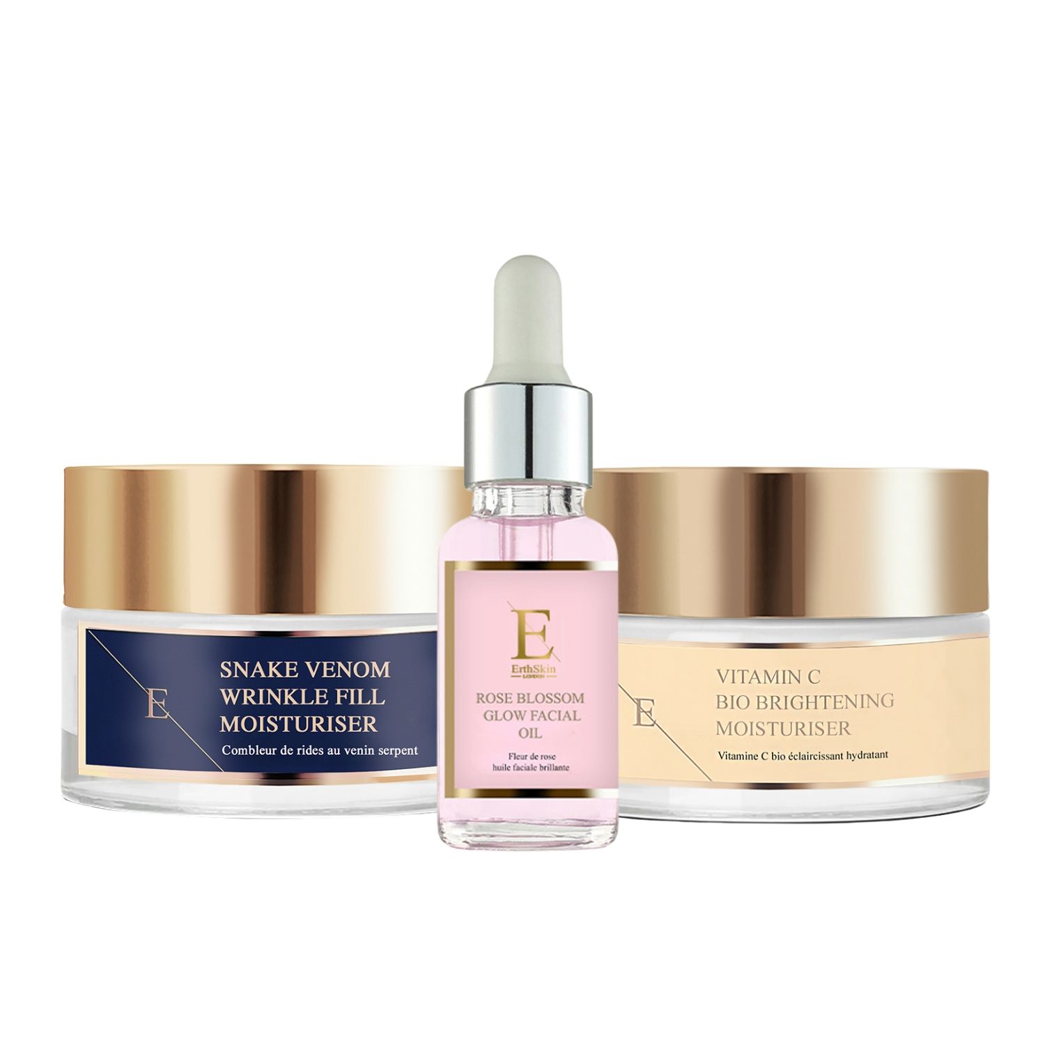 Set di prodotti per la cura della pelle. Barattoli e flacone con tappi dorati. Etichette blu e beige. Marchio visibile.