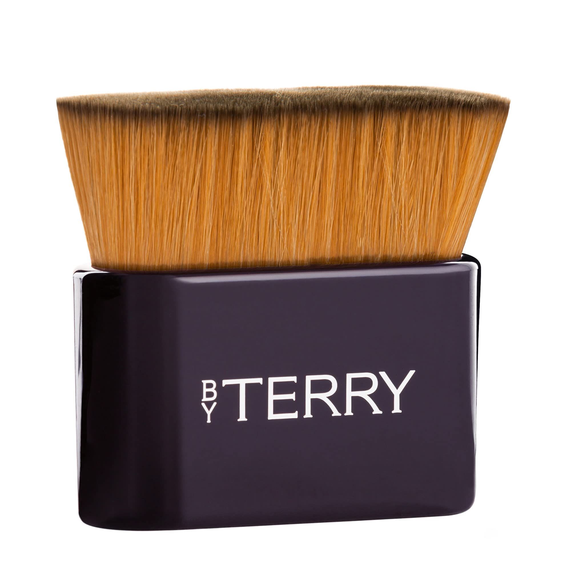 Pennello nero con setole marroni. Sul manico è scritto "BY TERRY".