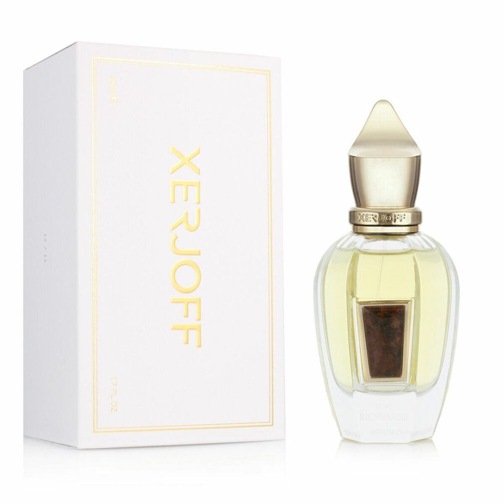 Flacone di profumo Xerjoff con tappo dorato e scatola bianca con scritte dorate.