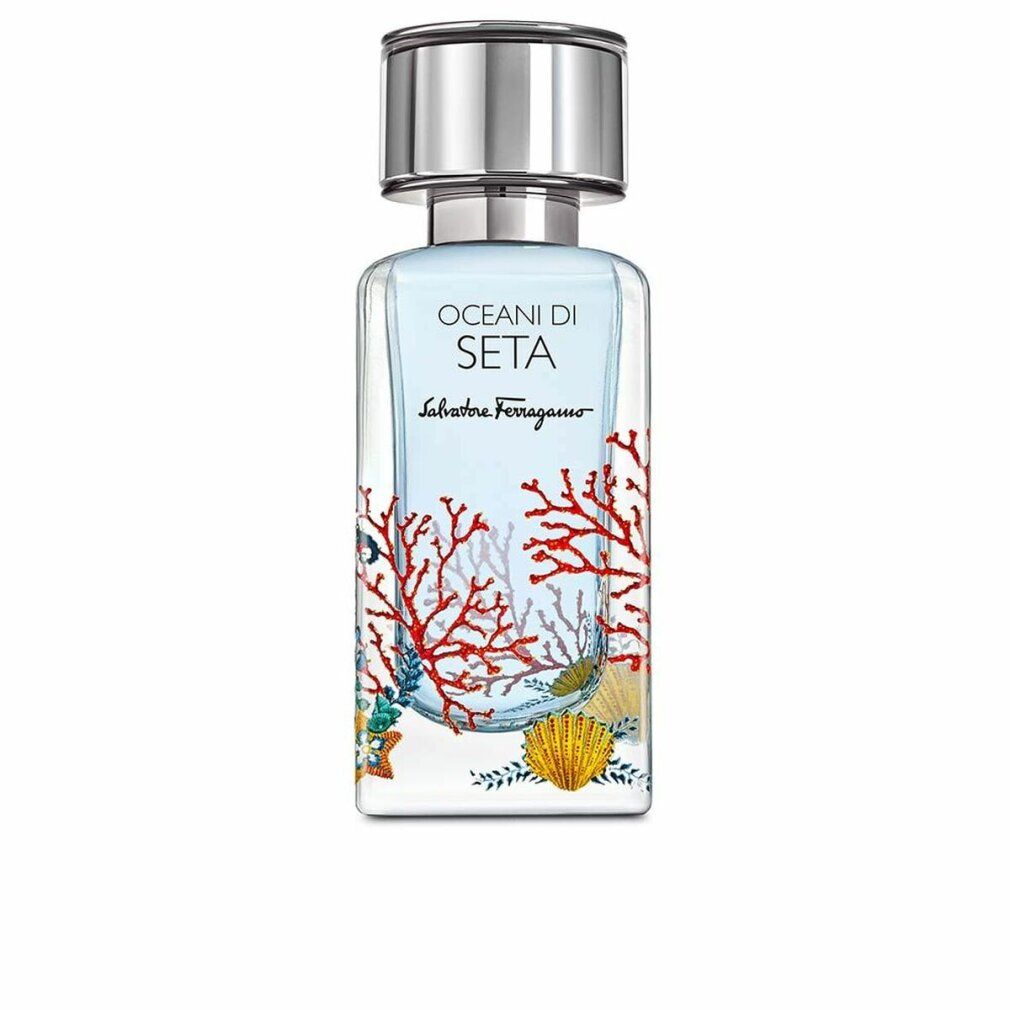 Flacone di profumo con tappo argentato. Scritta: Oceani Di Seta, Salvatore Ferragamo. Decorazioni coralli e conchiglie.