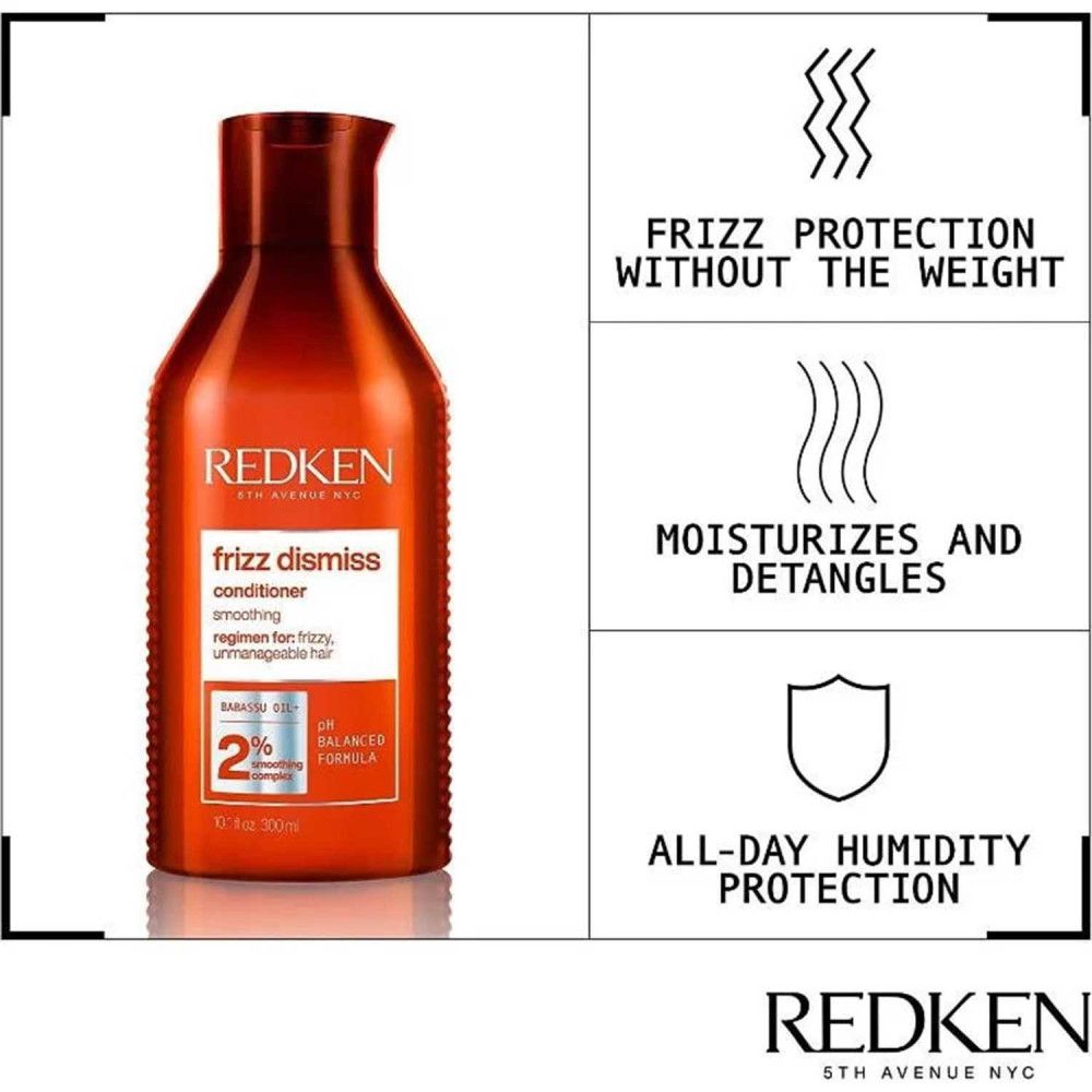 Flacone rosso Redken Frizz Dismiss. Testo: Protezione anti-crespo, idrata, districa, protezione umidità.