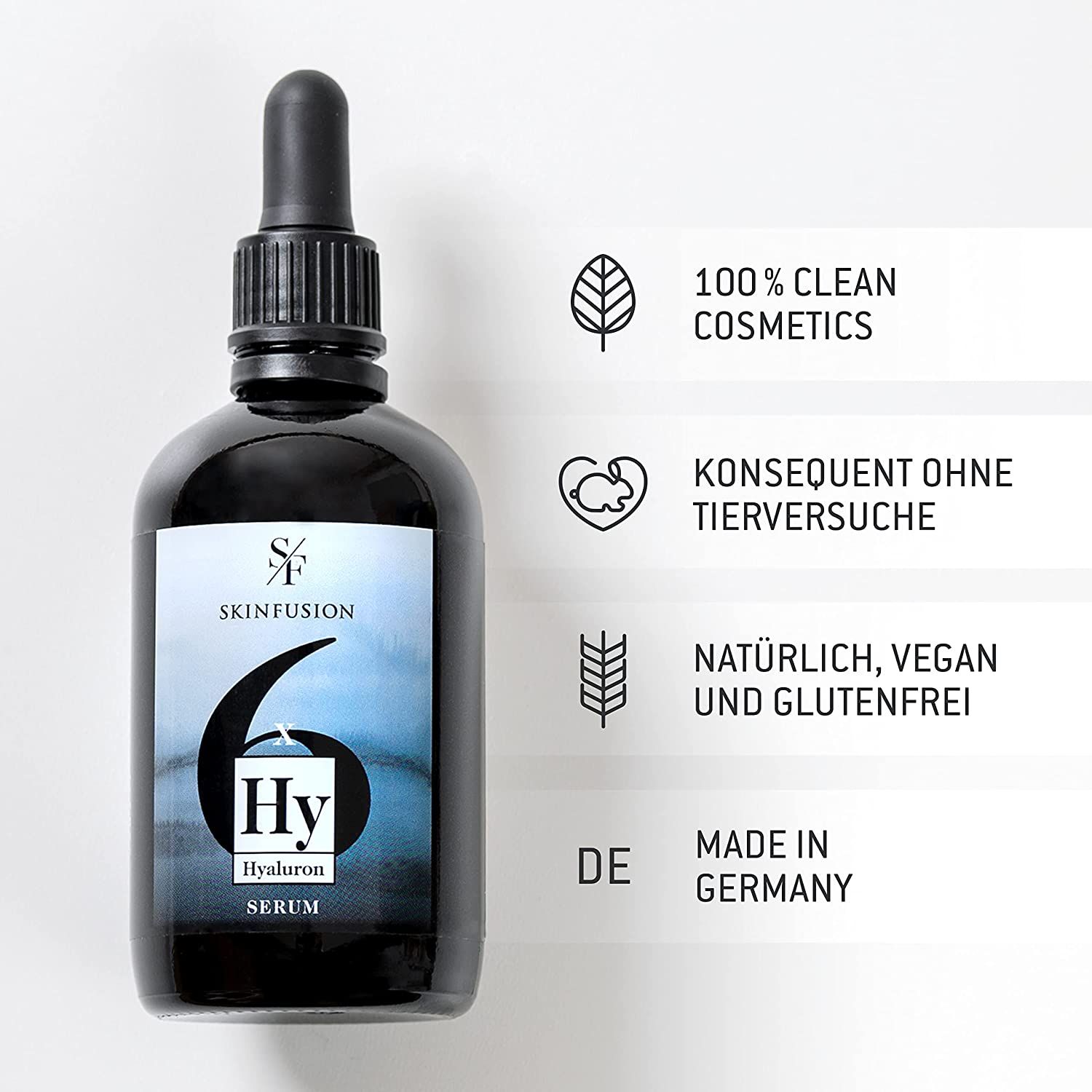 Flacone siero nero con certificazioni. Testo: 100% Clean Cosmetics, senza test sugli animali, vegano, senza glutine.