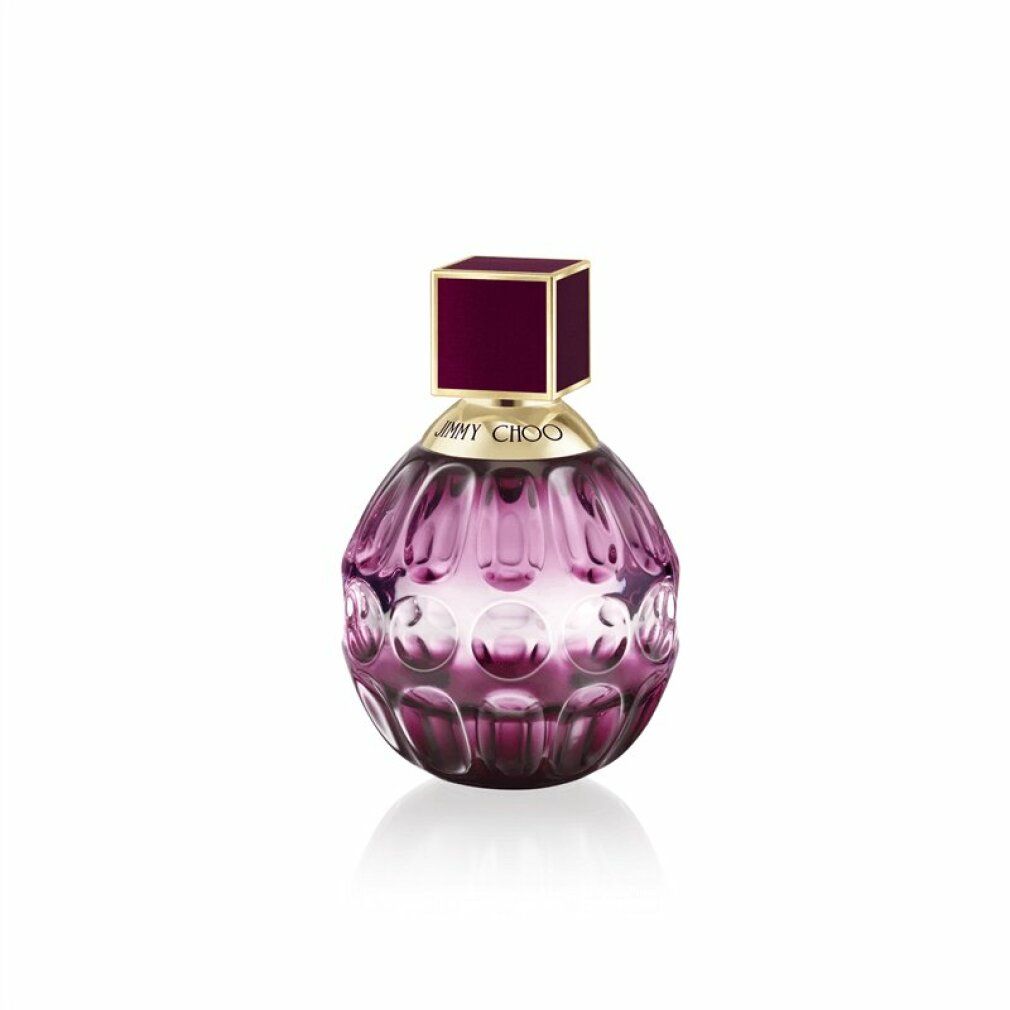 Flacone rotondo rosa di Eau de Parfum Jimmy Choo Fever. Tappo quadrato. Collo dorato.