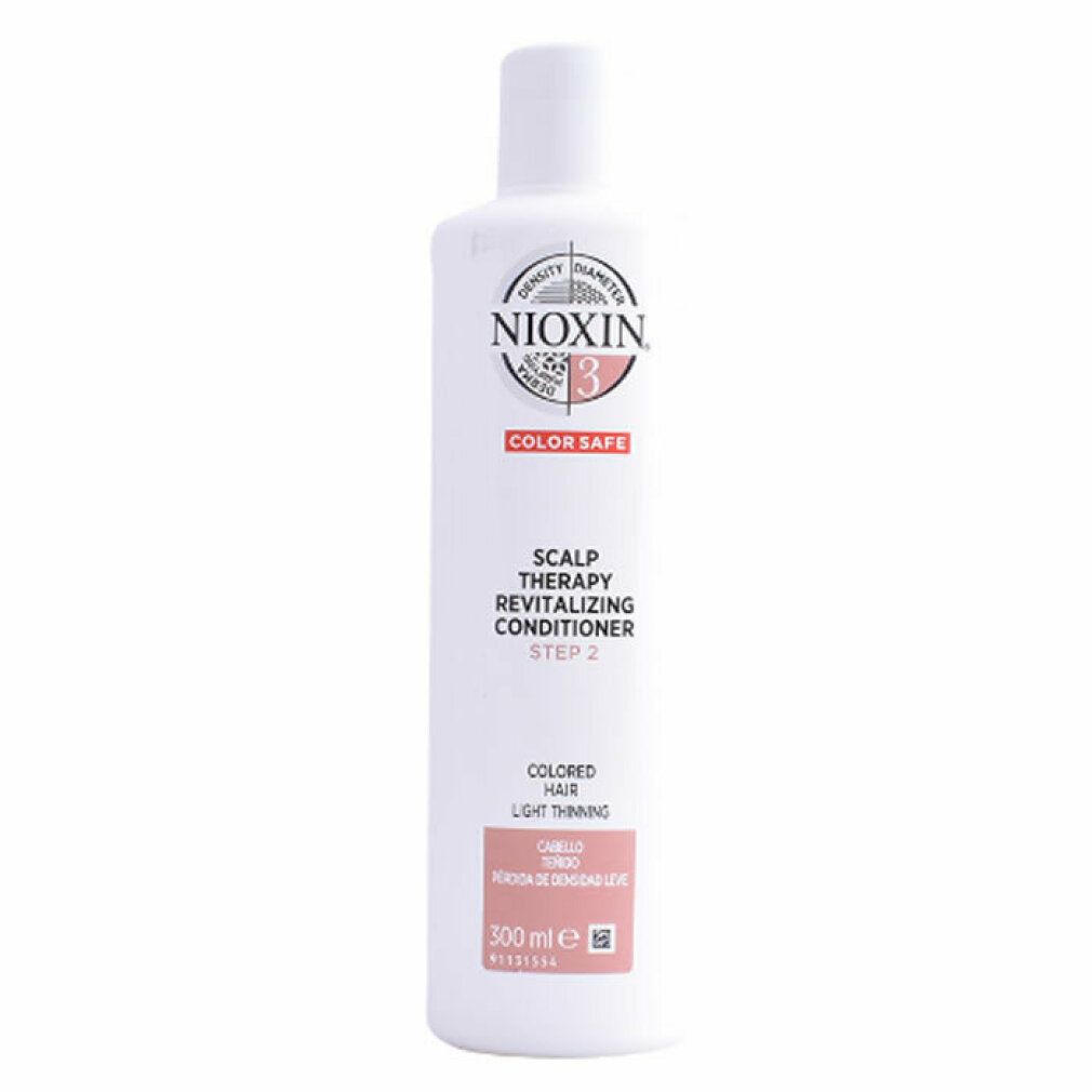 Flacone bianco con logo Nioxin e testo. 'Scalp Therapy Revitalizing Conditioner' e 'Color Safe' sono visibili. '300 ml' anche.