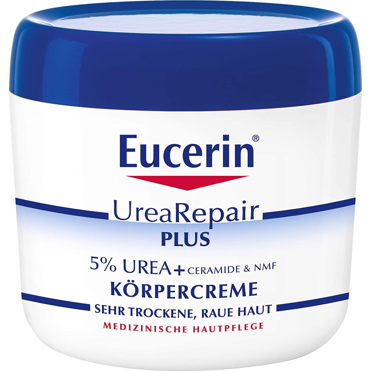 Crema corpo Eucerin UreaRepair PLUS in un vasetto bianco con coperchio blu. Il vasetto mostra il logo Eucerin e il nome del prodotto. Sulla parte anteriore sono presenti le scritte '5% UREA + CERAMIDE & NMF' e 'SEHR TROCKENE, RAUE HAUT'.