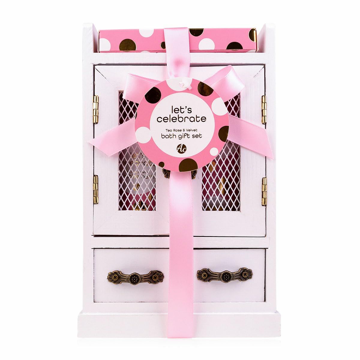 Set regalo con fiocco rosa. Include un armadietto a due ante e un cassetto. Scritta: Let's Celebrate.