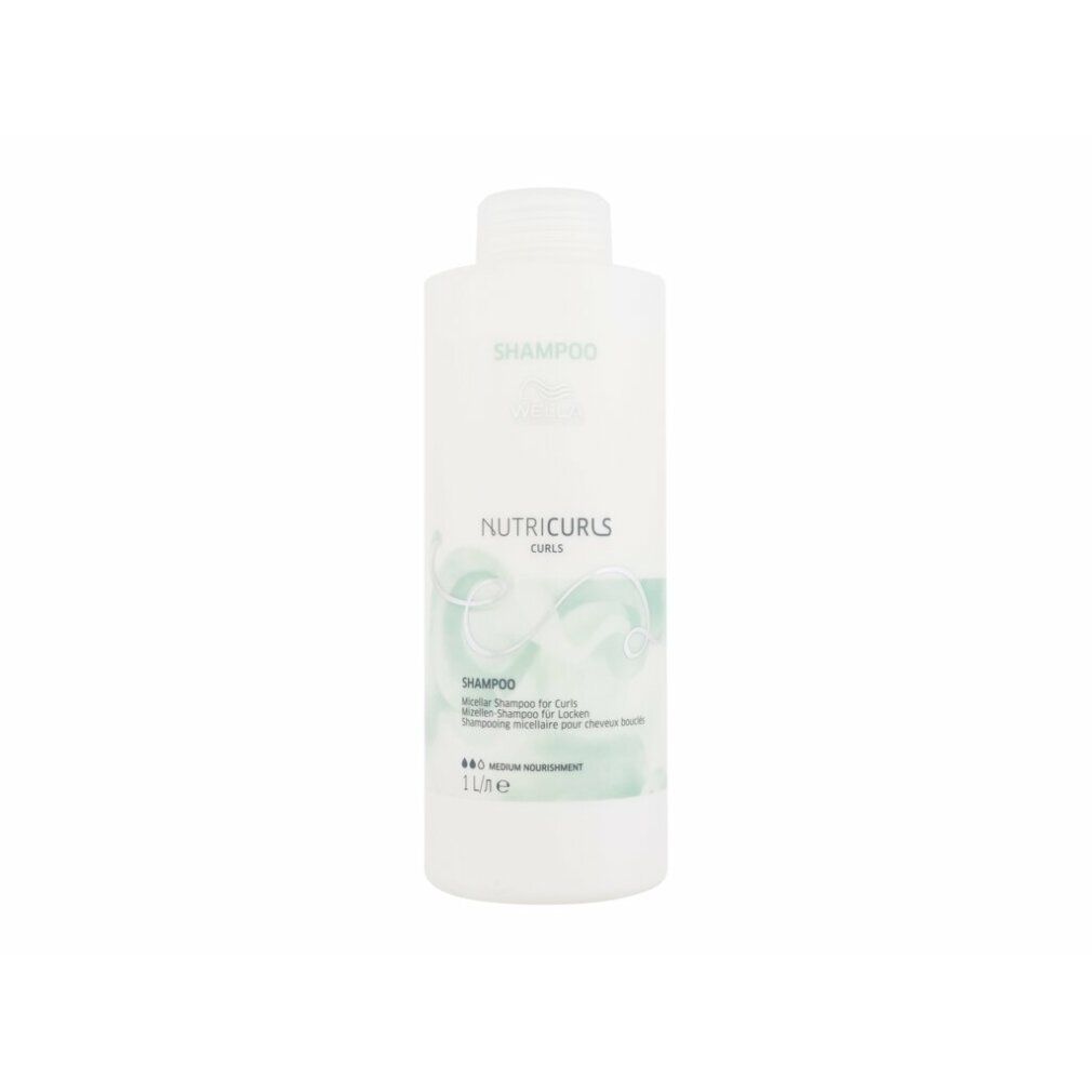 Flacone di shampoo bianco con etichetta verde. Scritta: Nutricurls, Shampoo. 1 litro. Per ricci.
