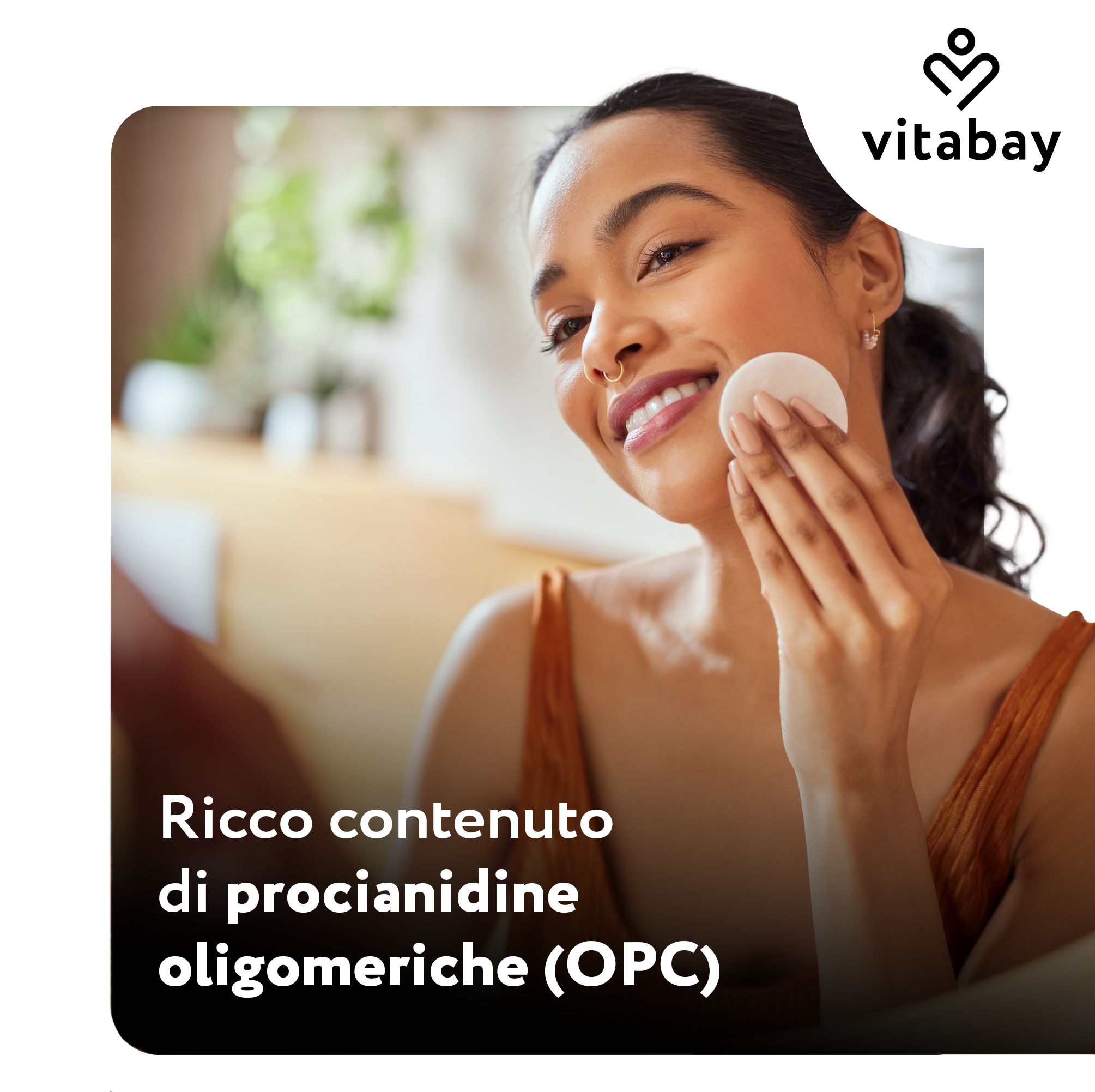 Donna che si pulisce il viso con un dischetto di cotone, Vitabay OPC Traubenkernextrakt.