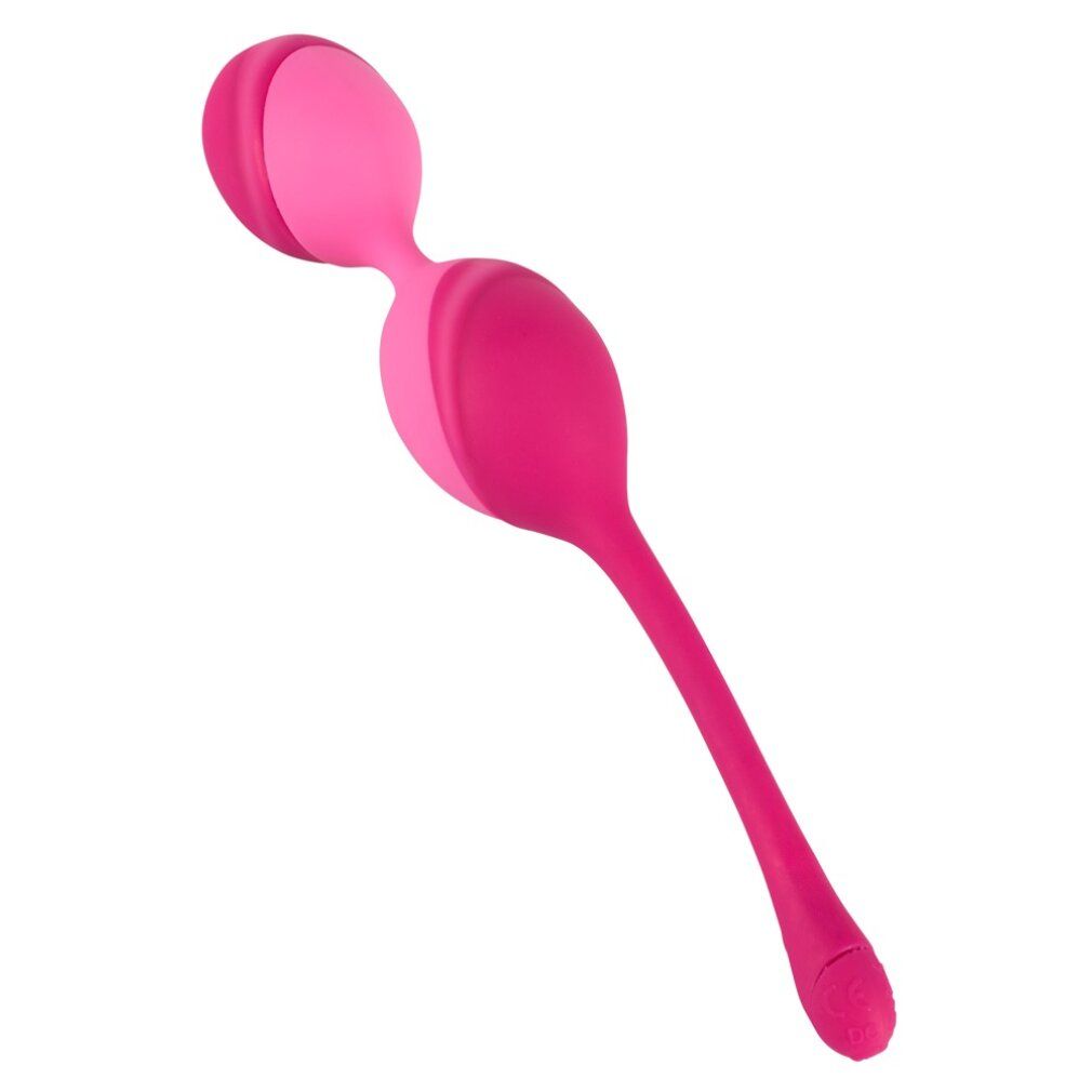 Duo di sfere vibranti rosa. Prodotto su sfondo bianco.