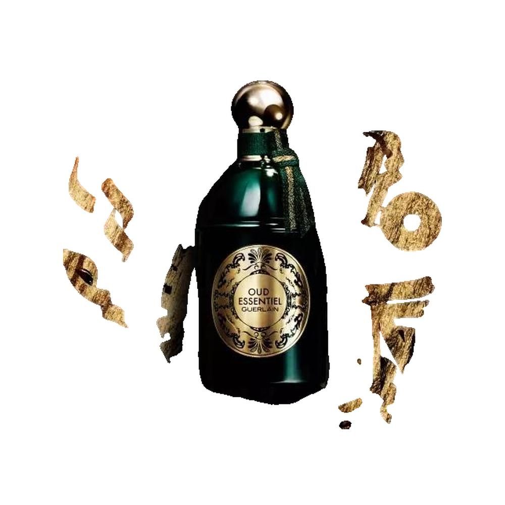 Flacone di profumo verde con tappo ed etichetta dorati. Scritta: Oud Essentiel. Elementi decorativi oro e marrone.