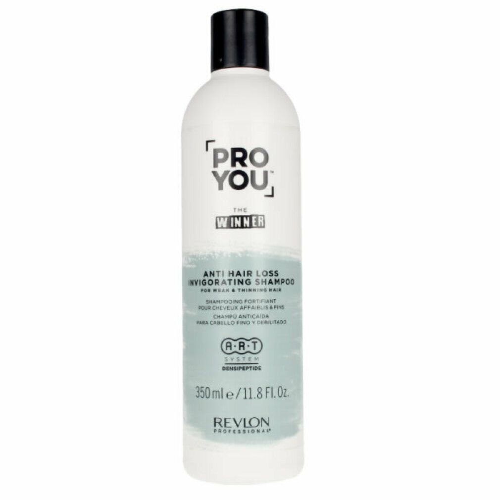 Flacone bianco con tappo nero. Scritta: PRO YOU, THE WINNER, shampoo anticaduta. Revlon Professional. 350ml.