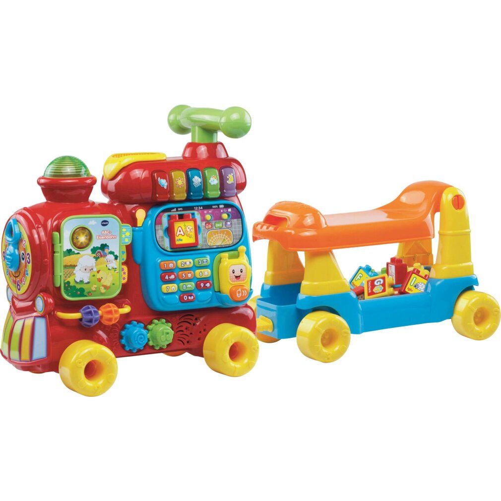 Treno VTech ABC rosso e blu con rimorchio. Il rimorchio ha ruote blu e sedile arancione. Il treno ha ruote gialle.