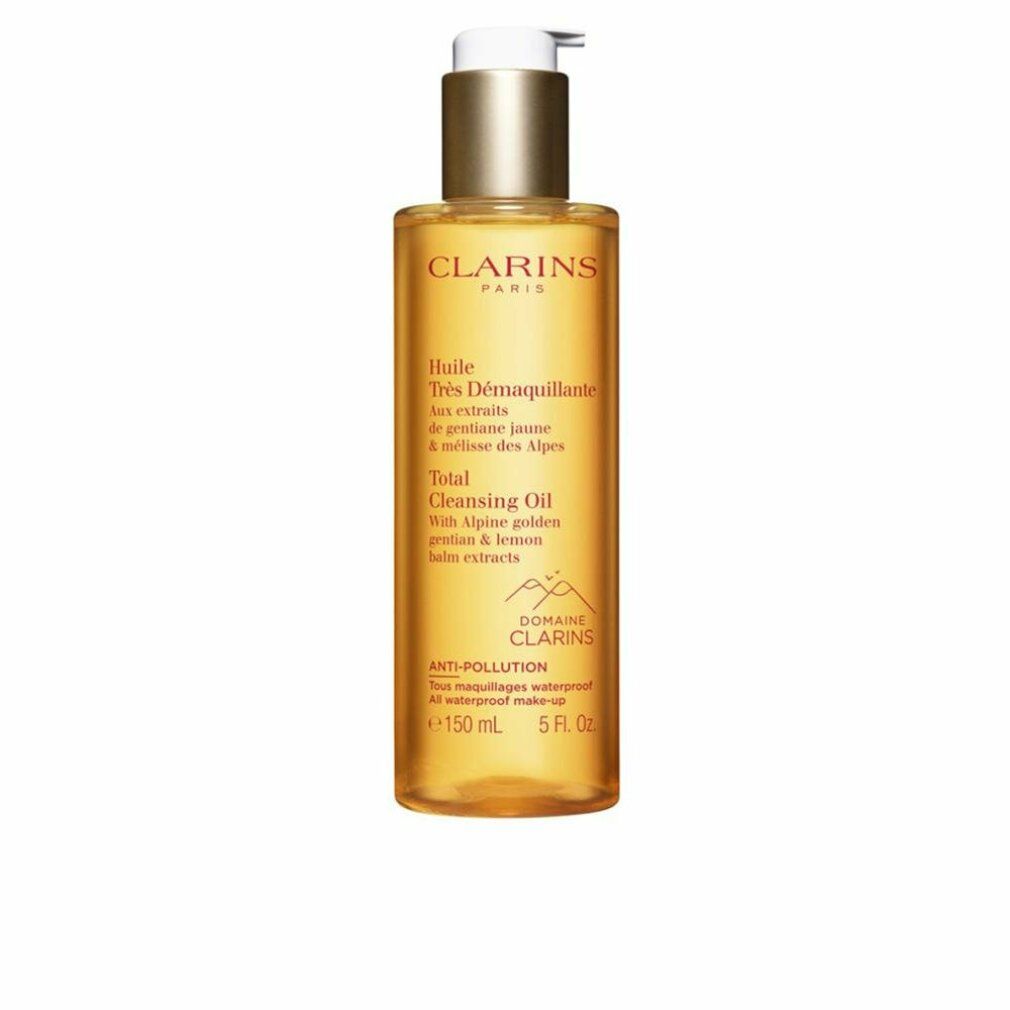 Flacone trasparente con liquido dorato e dosatore. Scritte: Clarins Total Cleansing Oil, 150 ml.
