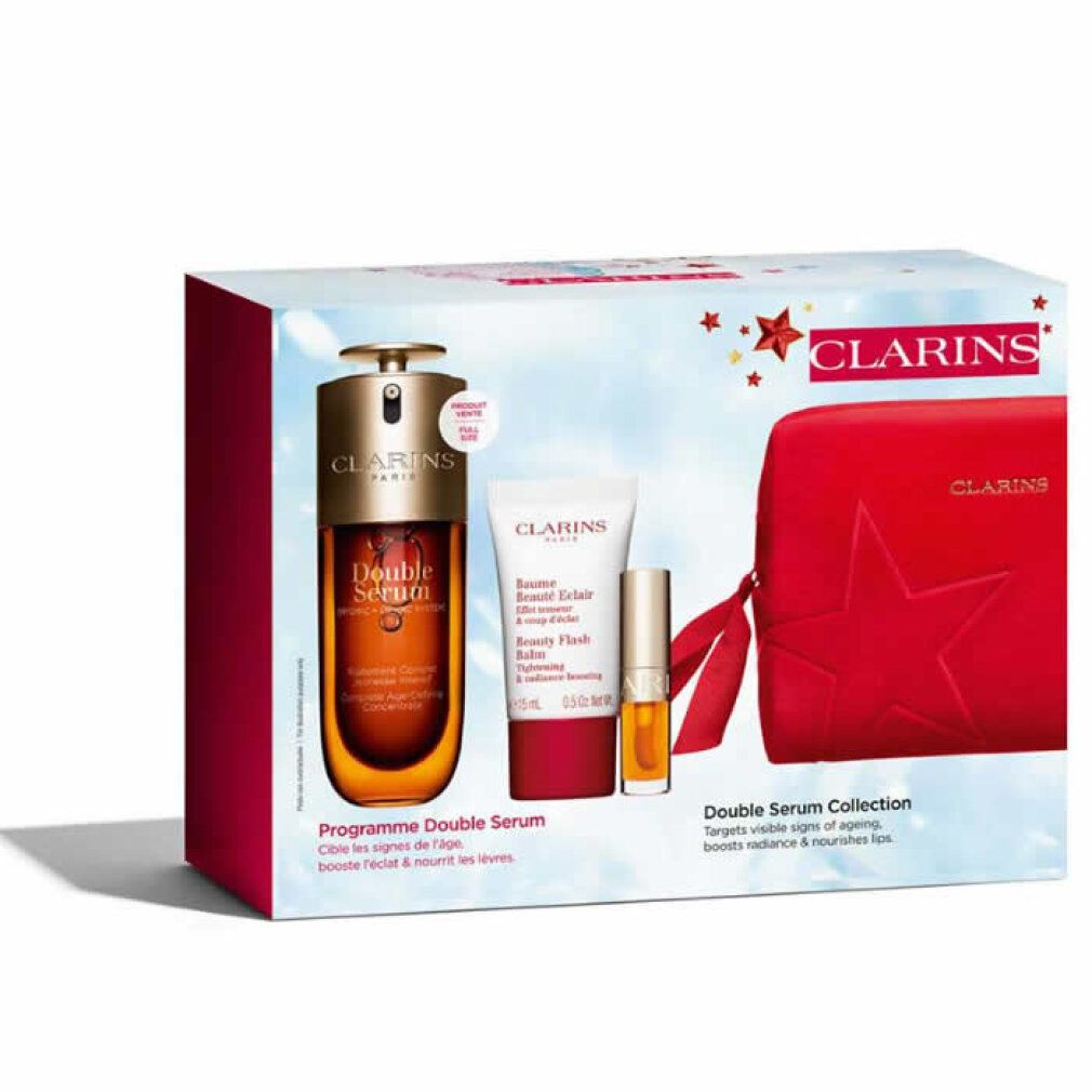 Set regalo Clarins. Siero, crema, pochette rossa. Scritta "Double Serum Collection". Elementi decorativi a stella.