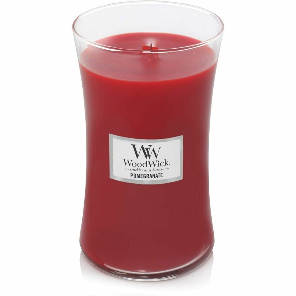 Candela rossa in vetro. Etichetta "WoodWick" e "Pomegranate".