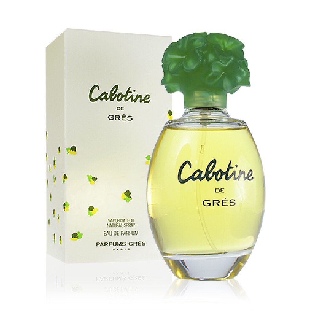 Flacone di profumo con tappo verde e scatola. Scritta: Cabotine de Grès.