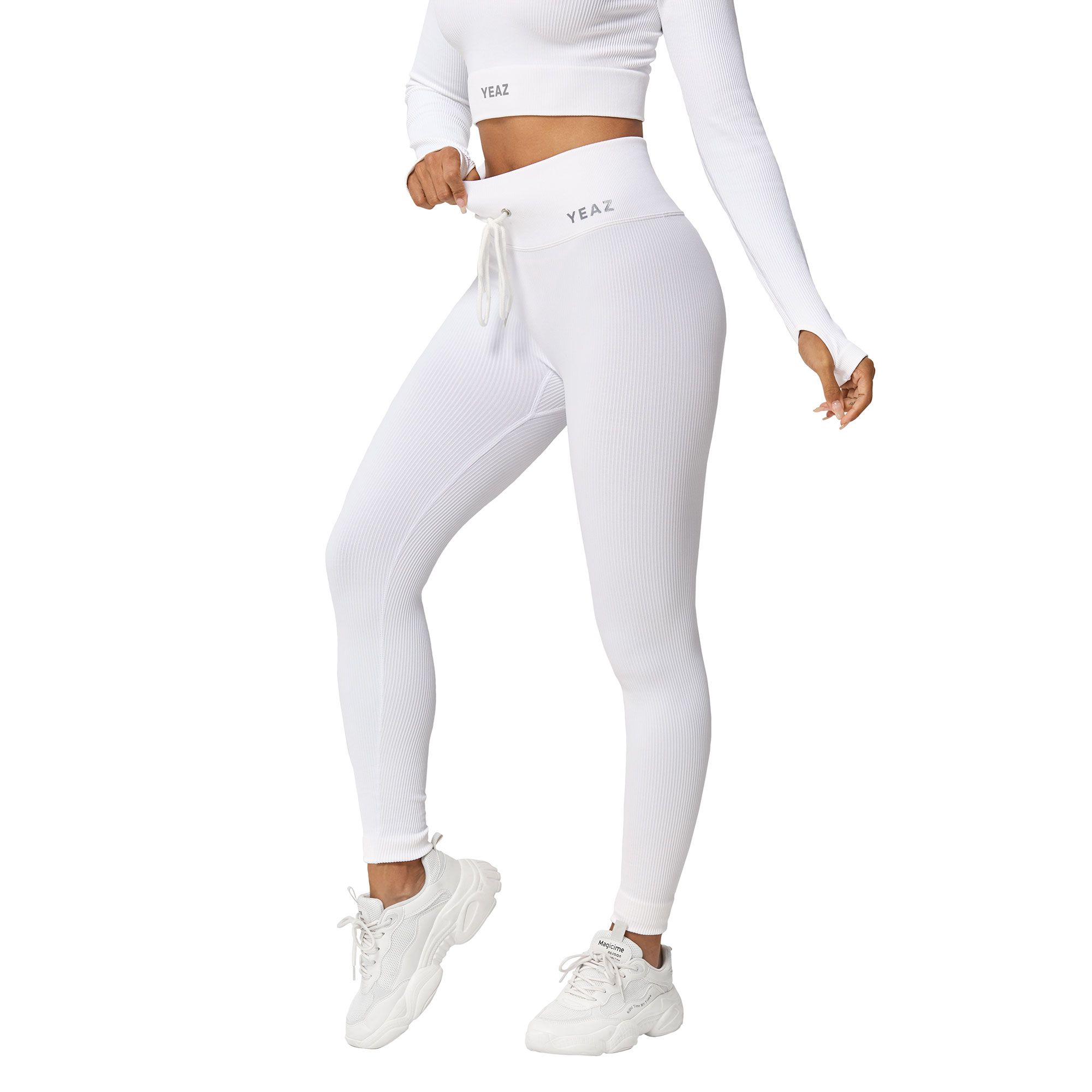 Leggings bianchi aderenti a vita alta con coulisse. Logo discreto in vita.