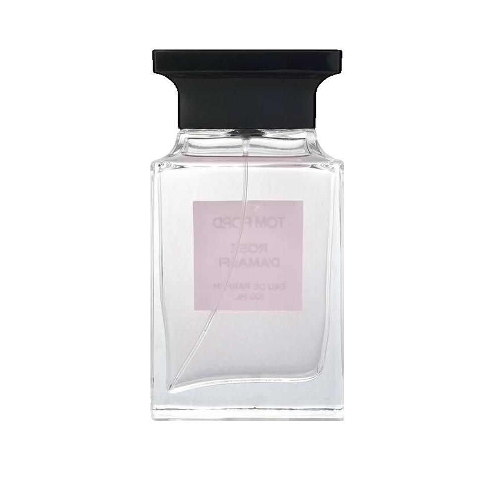 Flacone di profumo. Tappo nero, bottiglia rettangolare con etichetta bianca. "Tom Ford Rose D'Amalfi".