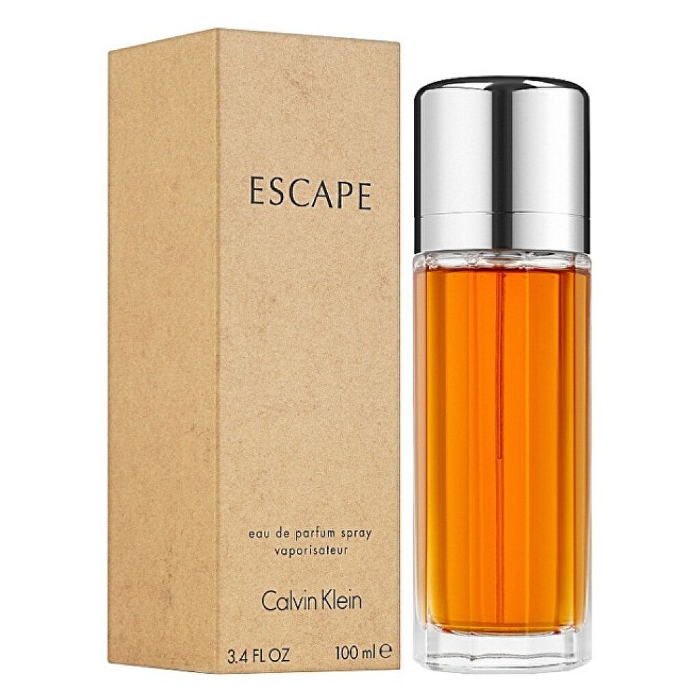 Flacone di profumo e scatola. Flacone con tappo argentato, contenuto dorato. Scatola con scritta "ESCAPE" e "Calvin Klein".