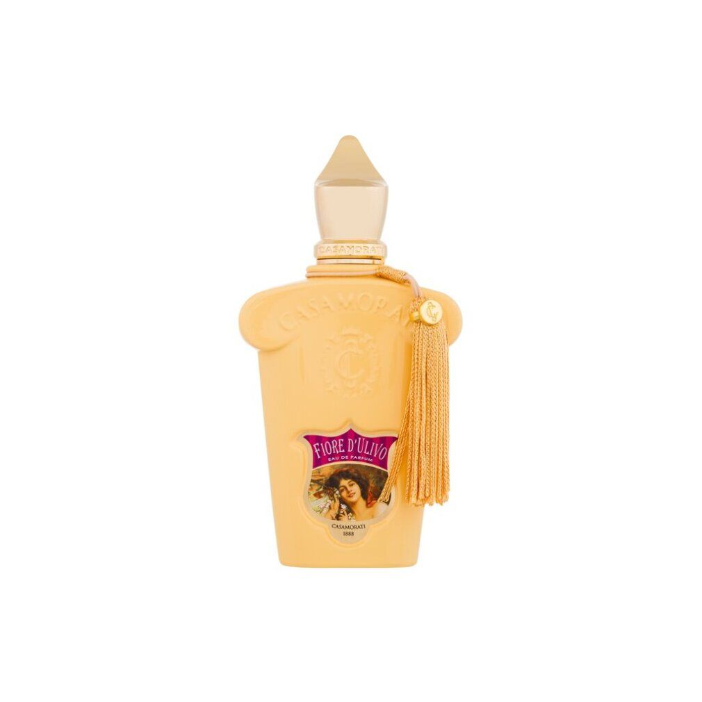 Flacone di profumo beige con tappo dorato e nappa. Scritte Fiore d'Ulivo e Casamorati.