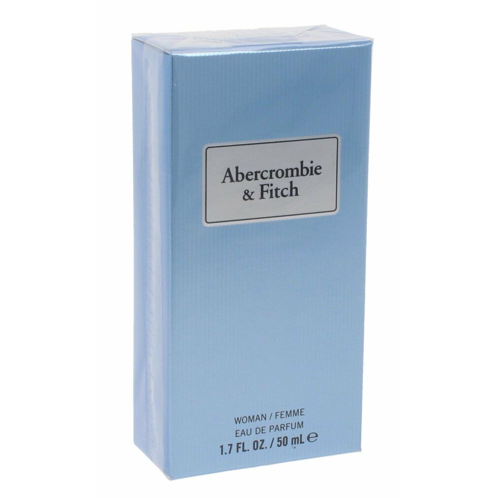 Confezione di profumo azzurro chiaro. Scritta: Abercrombie & Fitch. Testo: WOMAN/FEMME, Eau de Parfum, 1.7 FL. OZ./50 ml.