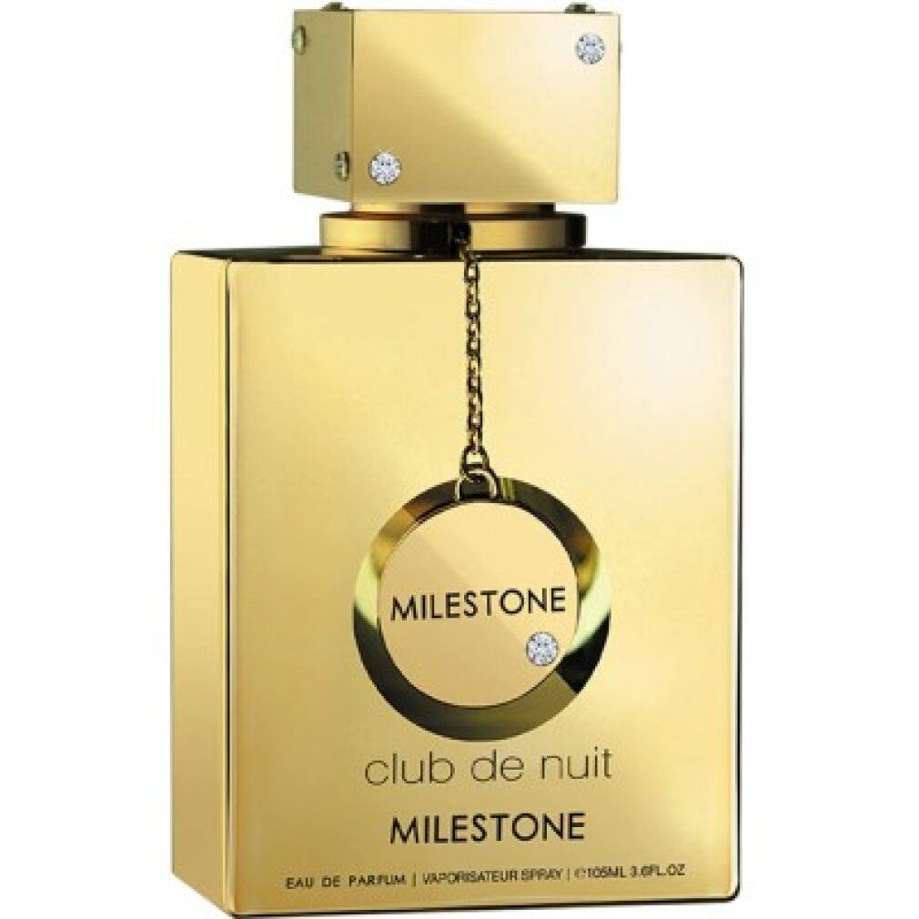 Flacone dorato di forma quadrata. Scritta 'Club de Nuit Milestone'. Flacone con pendente e strass.
