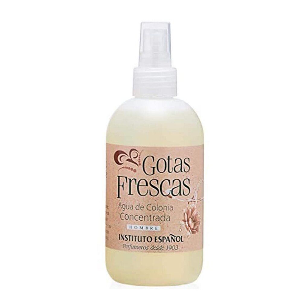 Flacone giallo chiaro con vaporizzatore. Scritta: Gotas Frescas, Agua de Colonia Concentrada, HOMBRE, INSTITUTO ESPAÑOL. Illustrazione di un fiore.