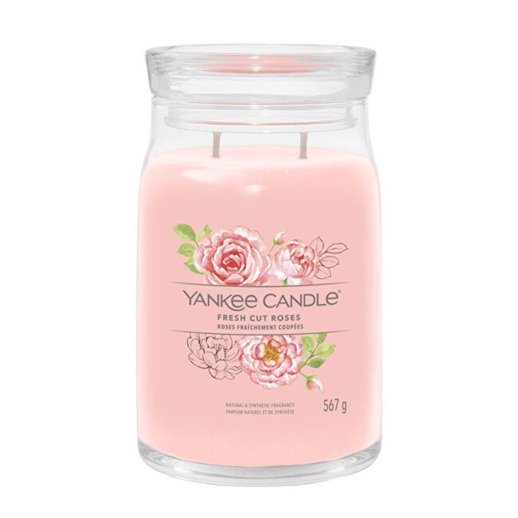 Candela Yankee Candle grande con coperchio. Cera rosa, due stoppini. Etichetta con rose e scritta 'Fresh Cut Roses'.