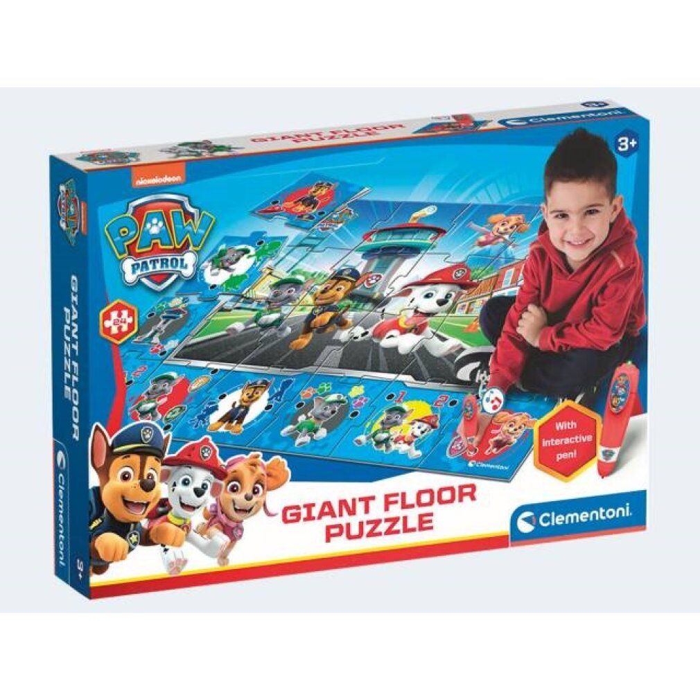 Scatola puzzle Paw Patrol. Ragazzo seduto accanto. Testo: Giant Floor Puzzle. Logo Clementoni. Con penna interattiva.