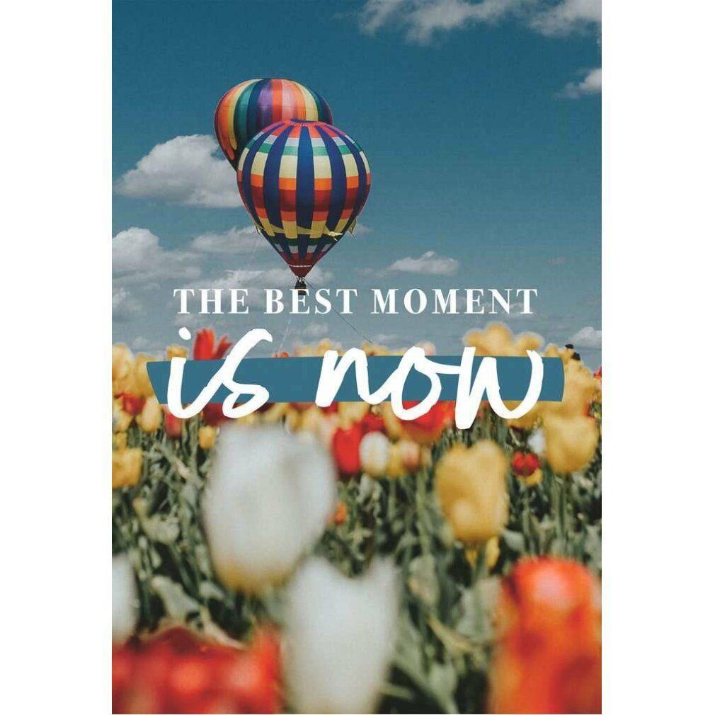 Motivo puzzle: mongolfiere su campo fiorito. Testo: The Best Moment is now. Marca: Ravensburger. 99 pezzi.