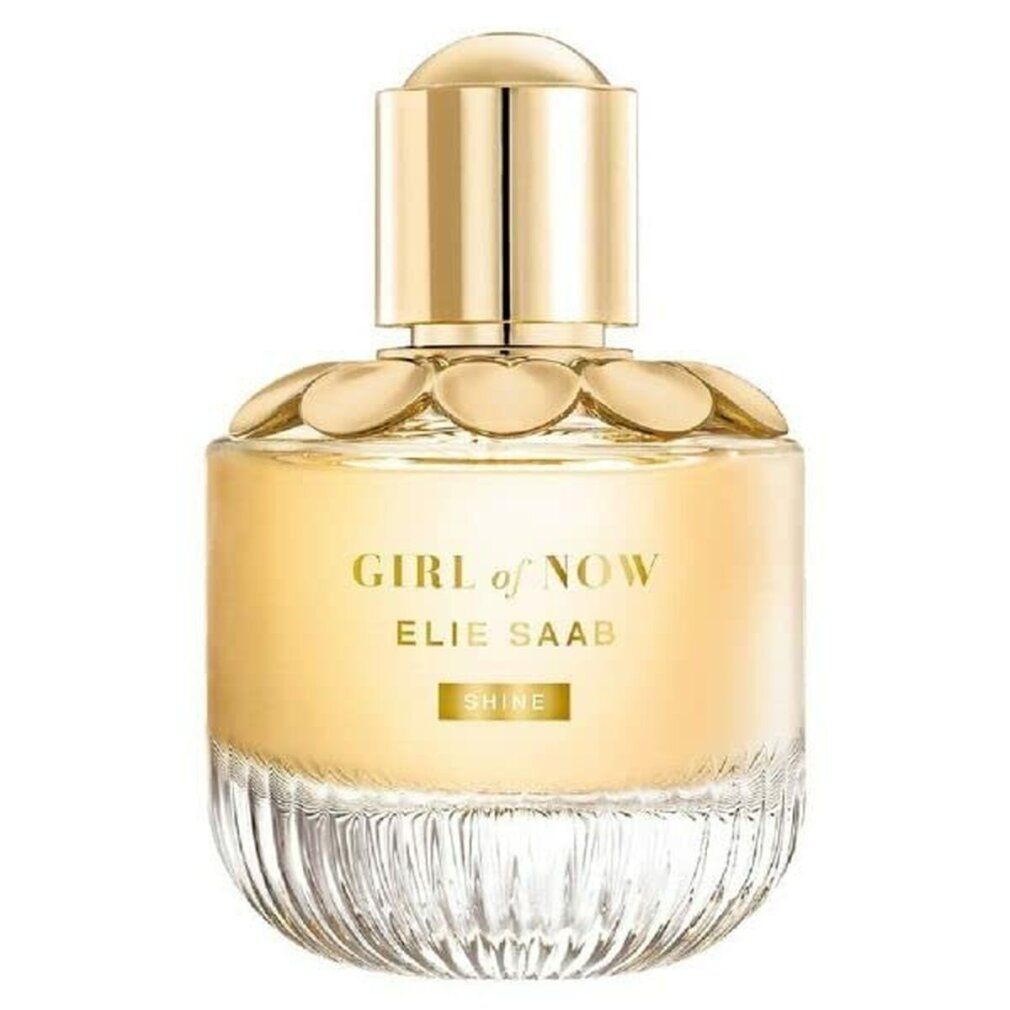 Flacone di profumo con tappo dorato e scritta. Scritta: GIRL of NOW, ELIE SAAB, SHINE.