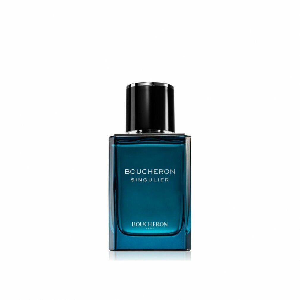 Flacone di profumo blu con tappo nero. Scritta: Boucheron Singulier. Forma quadrata.