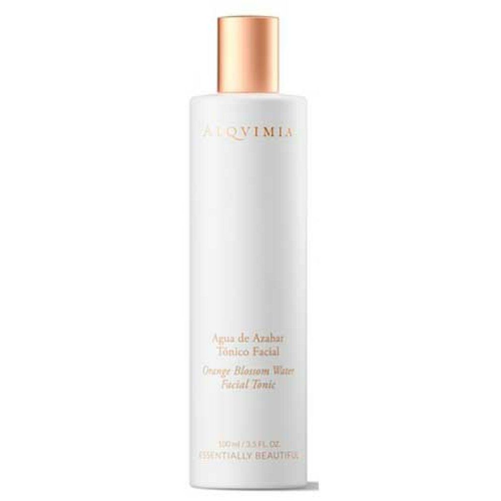 Flacone bianco con tappo dorato. Scritta: Agua de Azahar, Orange Blossom Water, Facial Tonic. Marchio Alqvimia.