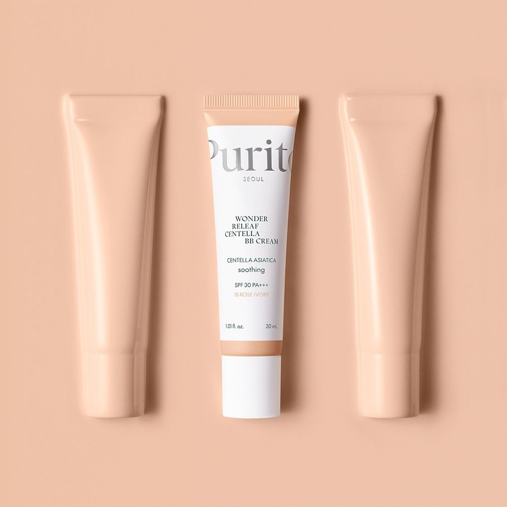 Purito Wonder Releaf Centella BB Cream, 15 Rose Ivory, affiancata da due tubetti vuoti.