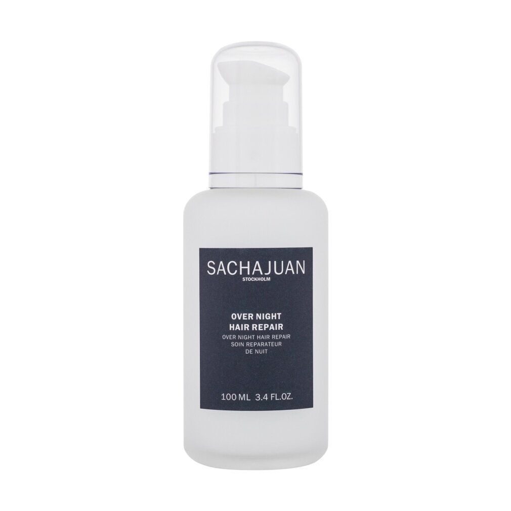 Flacone bianco con etichetta nera. Scritta: SACHAJUAN, OVER NIGHT HAIR REPAIR, PROFESSIONAL HAIRCARE. Con erogatore a pompa.