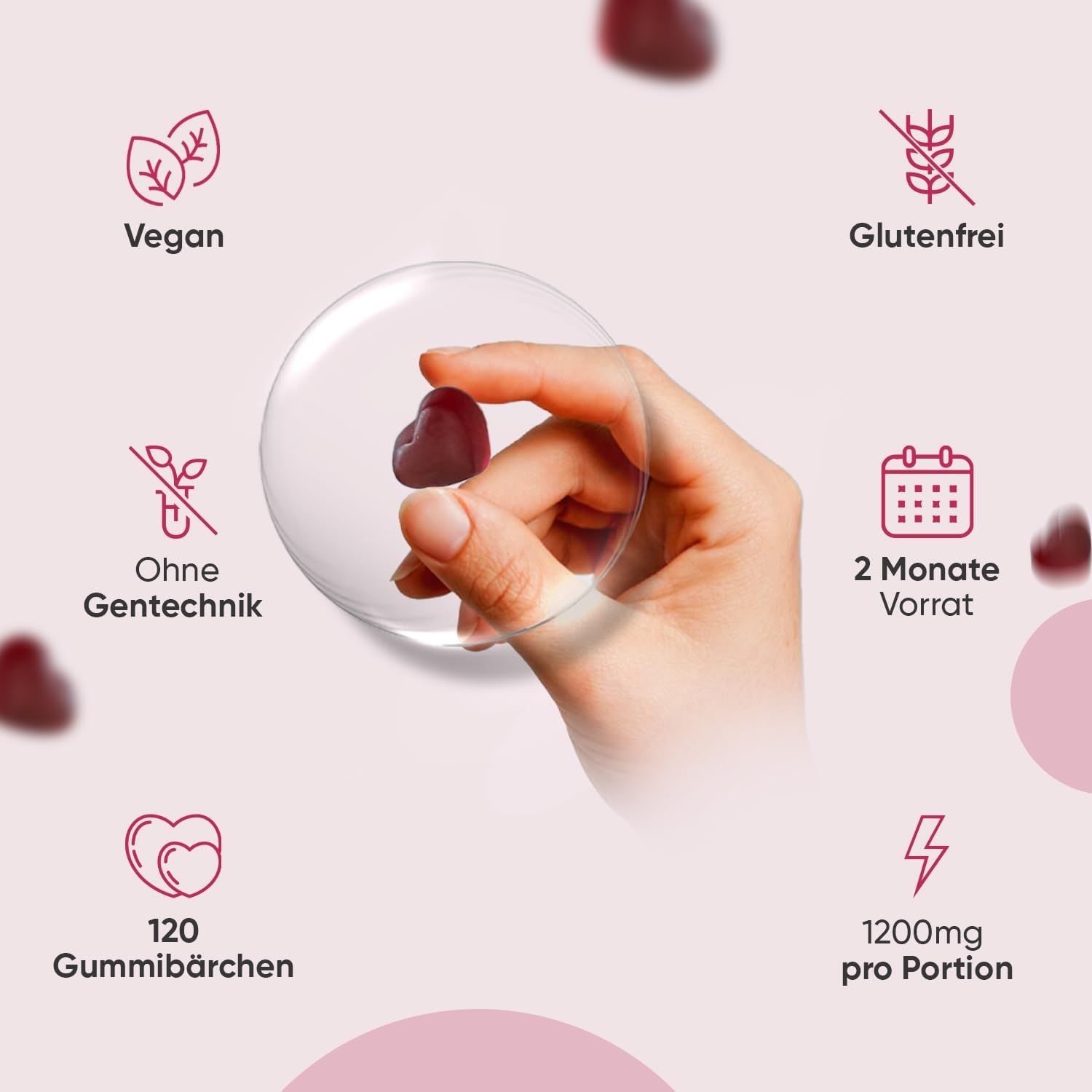 Mano che tiene una caramella gommosa a forma di cuore. Simboli: Vegano, senza glutine, senza OGM, 2 mesi di scorta, 120 caramelle gommose, 1200mg.