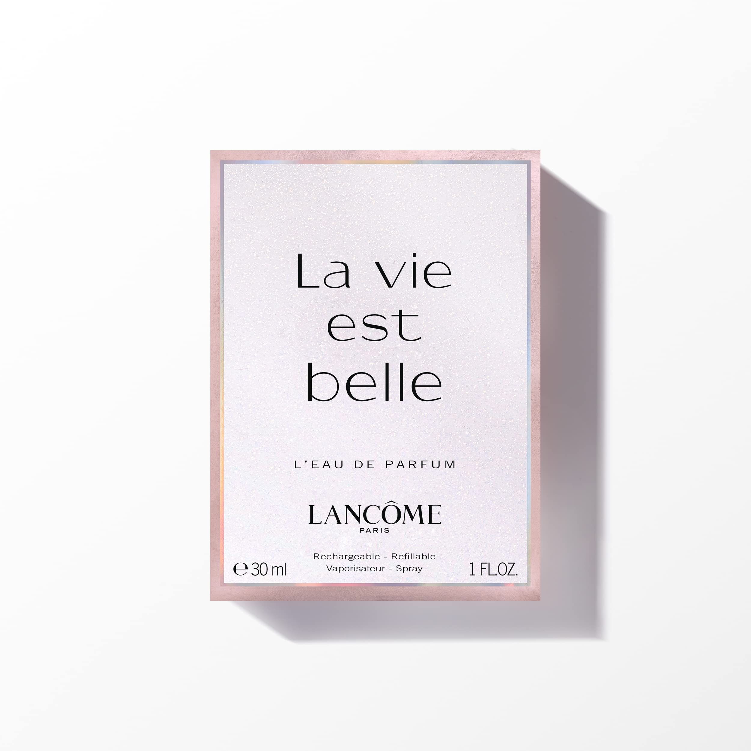 Confezione con flacone di profumo. Testo: La vie est belle, L'Eau de Parfum, 30 ml, 1 FL.OZ.
