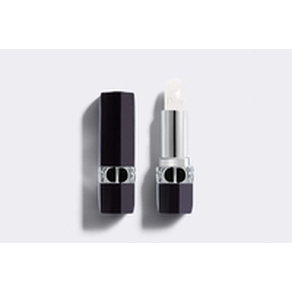 Balsamo labbra nero, aperto. Tubo argento con balsamo bianco. Logo Dior sul balsamo. Tappo nero accanto.