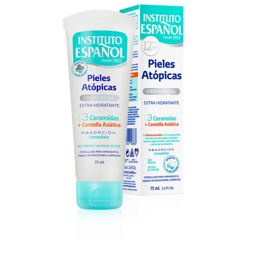 Tubo e scatola di crema. Scritta: Instituto Español, Pieles Atópicas, Creme Facial. Confezione turchese e bianca.