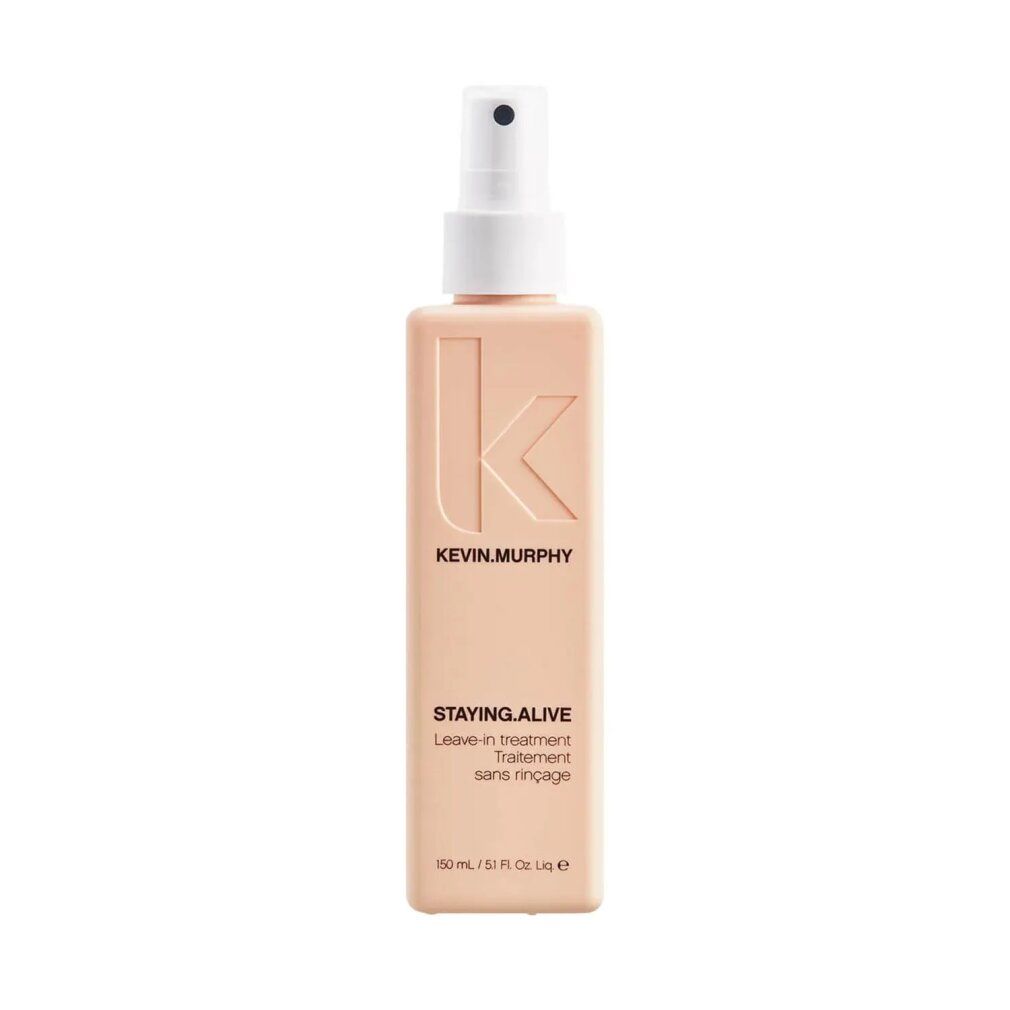 Flacone spray rettangolare beige con erogatore bianco. Scritta: Kevin Murphy, STAYING.ALIVE, Leave-in treatment, sans rinçage.